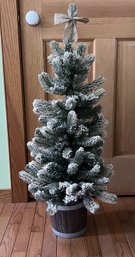 38' Tall Christmas Tree With Faux Snow On Bendable Branches In Small Bucket