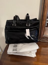 #745 Maxxium Tote With Dust Bag