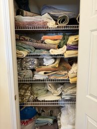 #749 Linen Closet Lot Rugs, Sheets Blankets, Etc....