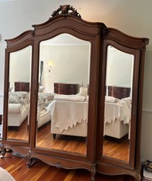 1890s Louis XV Style Walnut Triple Armoire With 3 Beveled Mirrored Doors And Gorgeous Carved Details - LR53