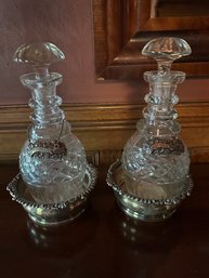 Two Crystal Decanters With Silver Plate Name Tags With Pair Of Silver Plate Bottle Holders  -DR7