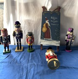 #965 Lot Of 6  Containing 4 Nutcrackers, 1 Stocking Nutcracker, 1 Hanging Sled