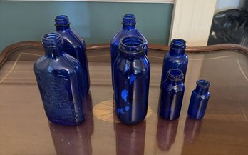 #95 Lot Of 7 Blue Glass Medicine Bottles