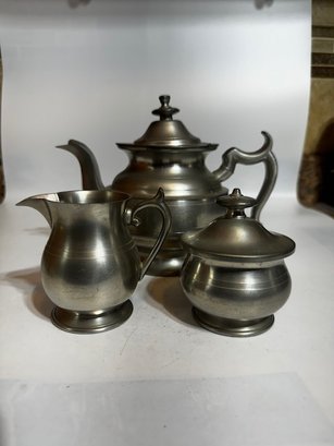 A Pewter Tea Set With Creamer And Sugar Bowl By Woodbury