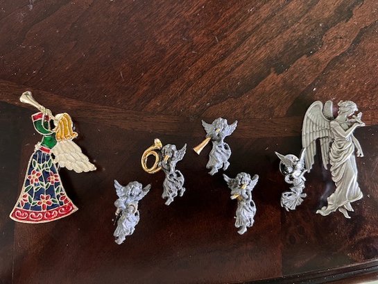 A Groupof Small Angel Pins