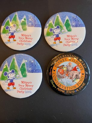 A Group Of 4 Round Button Pins Disney Very Merry Christmas 2002 And Conservation Hero
