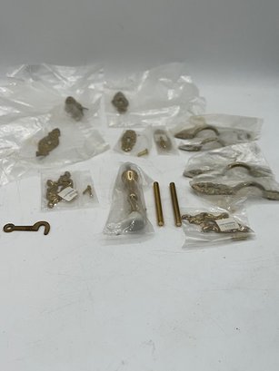 A Group Of New Brass Door Pulls, Stopper, Key Covers Etc 15 Items