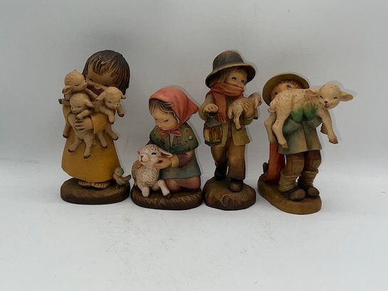 A Grouo F Of 4 ANRI Made In Italy Hand Carved Figurines Shepherds With Lambs Etc