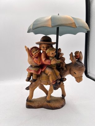 Hand Carved And Painted ANRI 10' Riding Through The Rain