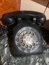 A Black Rotary Dial Bell Telephone Desk Style
