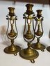 A Group Of 4 Brass Hanging Ship Candle Holders