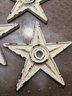 A Group Of 3 White Cast Iron Building Stars