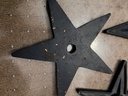 A Group Of Three Navy Blue Cast Iron Building Stars