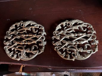A Pair Of Brass Trivetrs From Colonial Wiliamsburgh Virginia