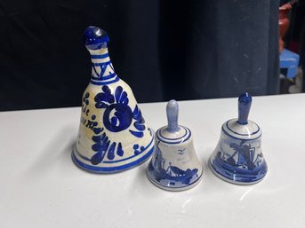 A Group Of Three Blue And White Bells, Soth American And Delft