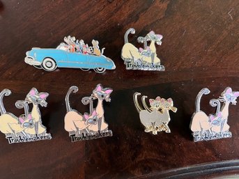 A Group Of Disney Pins And Magnets Troublemakers!