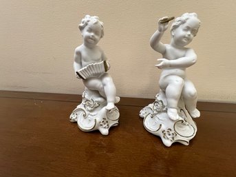 A Pair Of Isco Bisque Parian Cherubs Made In Germany