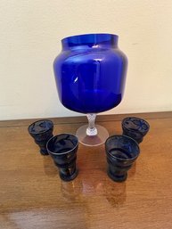 A Group Of Cobalt Glass, 4 Shot Glasses With Sterling And A Footed Handblown Glass Bowl