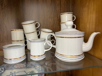 Gold And White Porcelain Tea Set With Creamer And Sugar