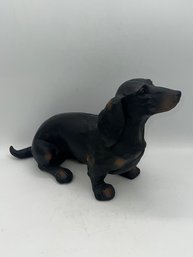 A Dachsund Figurine By Touch Of Class Morning Walk