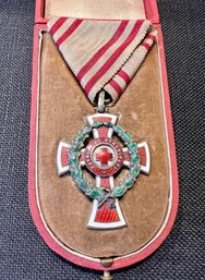 AUSTRIA, EMPIRE. AN HONOR DECORATION OF THE RED CROSS, FIRST CLASS WITH WAR DECORATION, C.1914