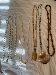 A Group Of Retro Necklaces Shell, Bone Pooka Beads