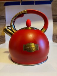 A Red Susteas Tea Kettle