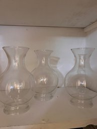 A Group Of Oil Lamp Glass Funnels