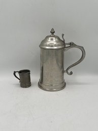 A Pewter Covered Beer Stein By Woodbury And A Mini