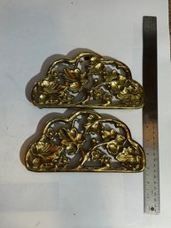A PAIR OF HARVIN LEAF BRASS TRIVETS COLONIAL WILLIAMSBURGH
