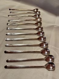 A Group Of 12 Ice Tea Spoons