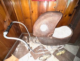 A Vintage Wicker Baby Carriage
