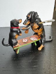 Bronze Dachsunds Playing Cards On A Bench