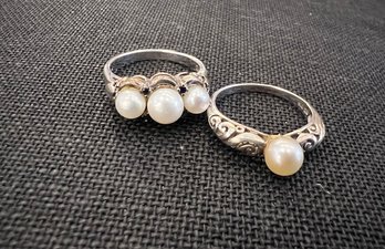 A Group Of 2 Pearl And Sterling Silver Rings
