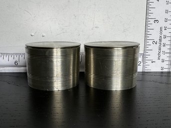 A Pair Of Pewter Covered Canisters 2' Tall