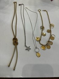 4 Great Necklaces Including 925 Silver And Marc Jacobs And An Italian Lariat