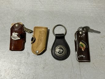 A Group Of Vintage Indian Key Chains