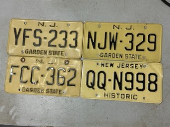 A Group Of 4 New Jersey License Plates