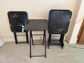 A MCM Set Of Formica Folding Snack Tables With Stand