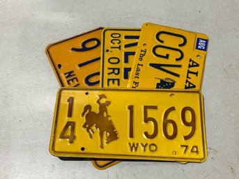 A Group Of 4 1970's License Plates