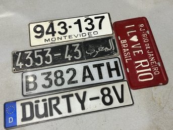A Group Of 5 European License Plates