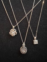 A Group Of 3 Pendant Necklaces Sterling Silver Crystal And Pearl
