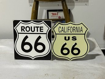 A Pair Of Route 66 Metal Signs