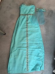 TRULY A 1960's - 70's FIND. Turquoise Gown With Banded Embroidered Trim And That Hair Piece!