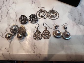 A Group Of 5 Pairs Of Silver Earrings Pierced
