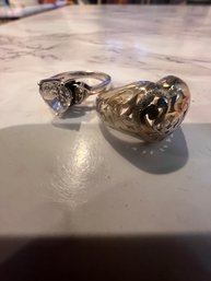 A Pair Of Zirconia Rings In Heart Shapes, Set In Sterling Silver