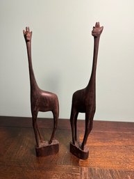 A Pair Of Wood Carved Giraffes Approx 8' Tall