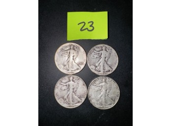 A Group Of 4 Walking Liberty Half Dollars #23