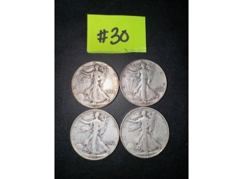 A Group Of 4 Walking Liberty Coins