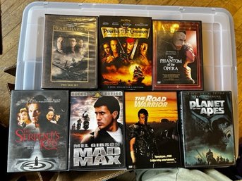 Lot Of 7 Action DVD's Including Mad Max, Planet Of The Apes, Pirates Of The Caribbean Etc,